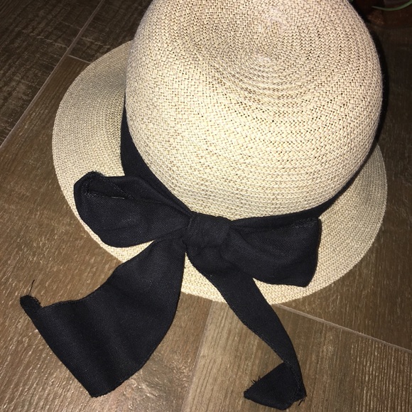 Spring straw hat with black ribbon detail. - Picture 8 of 8